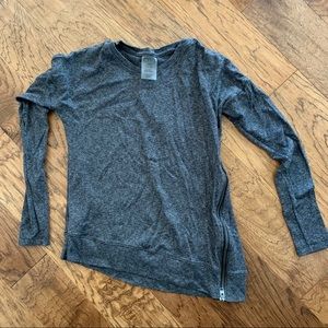 Asymmetrical sweater with zipper